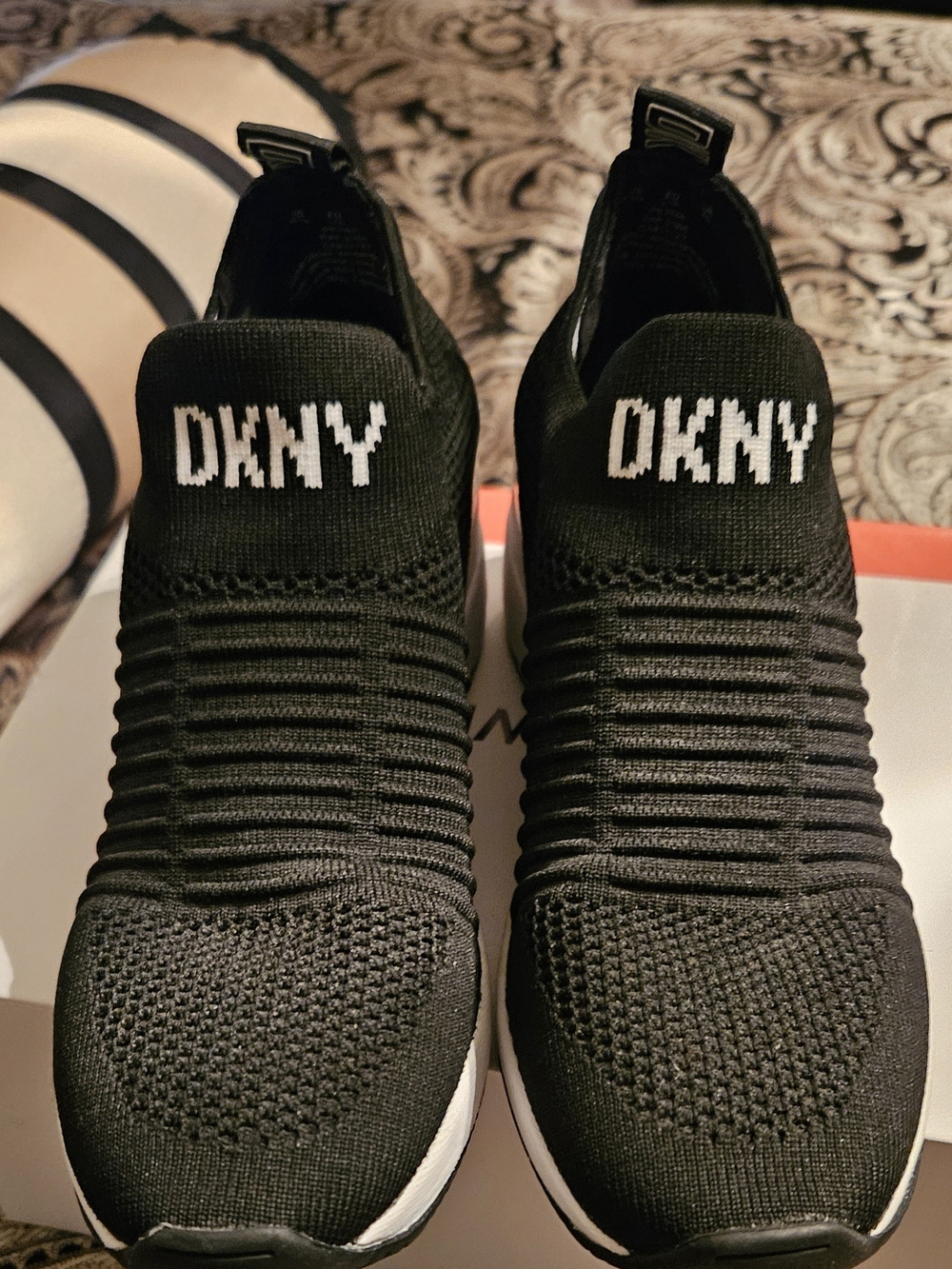 DKNY Woman’s Black Slip-On Knit Sneakers